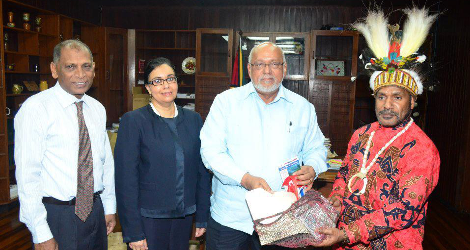 Benny (far right) pictured presenting the President of Guyana (second right) with a West Papua flag and documentation about the ongoing struggle for freedom in West Papua. Also pictured is Melinda Janki (co-founder of International Lawyers for West Papua), and the Deputy Foreign Minister of Guyana (left)